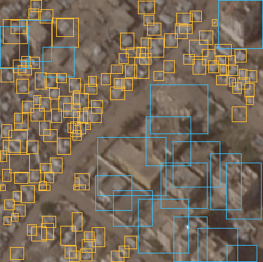 131 amber tent boxes and17 light-blue building boxes on the same training crop